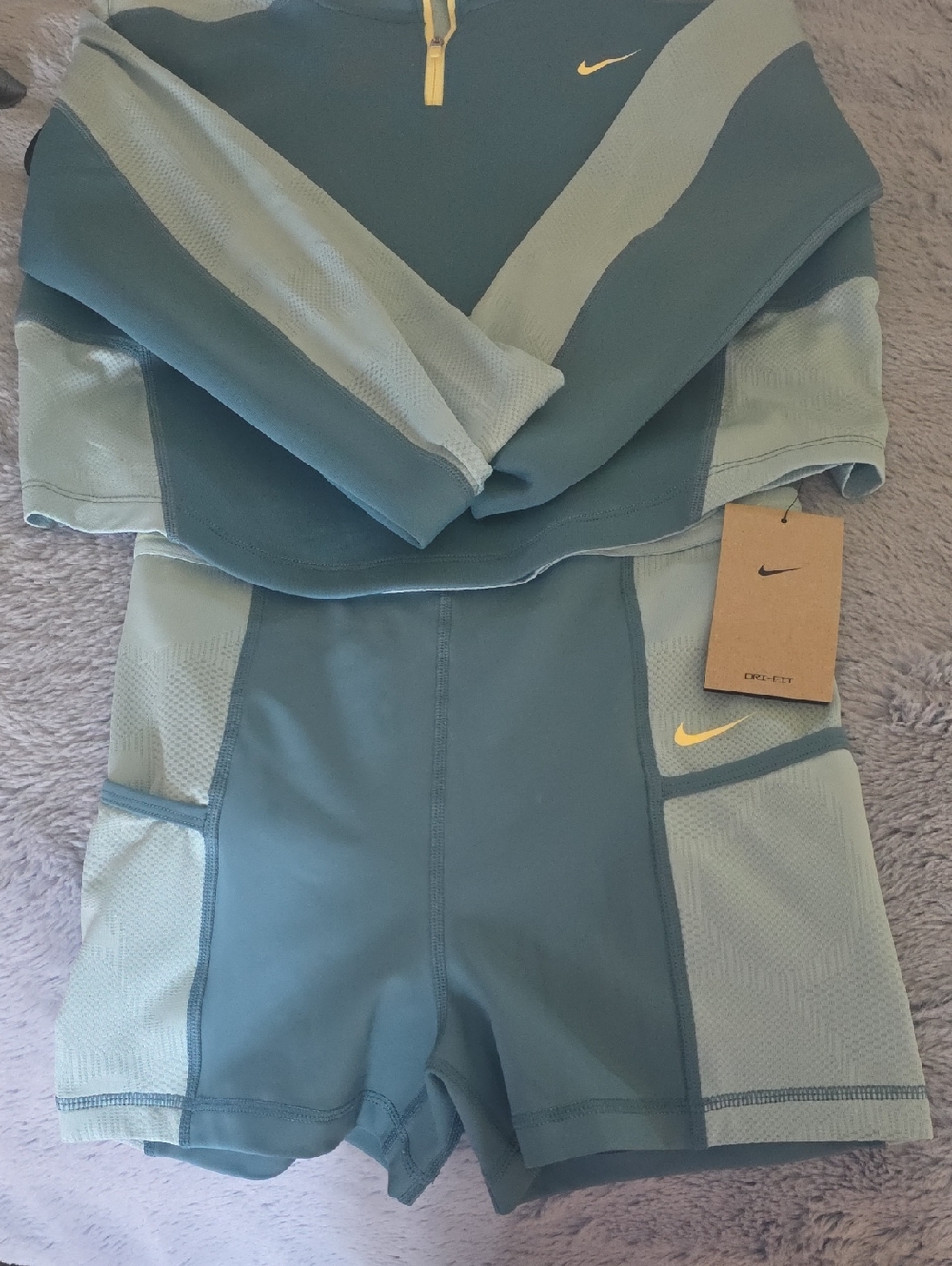 Nike Womens Teal and Light Teal Active One-Piece Set with Yellow Swoosh